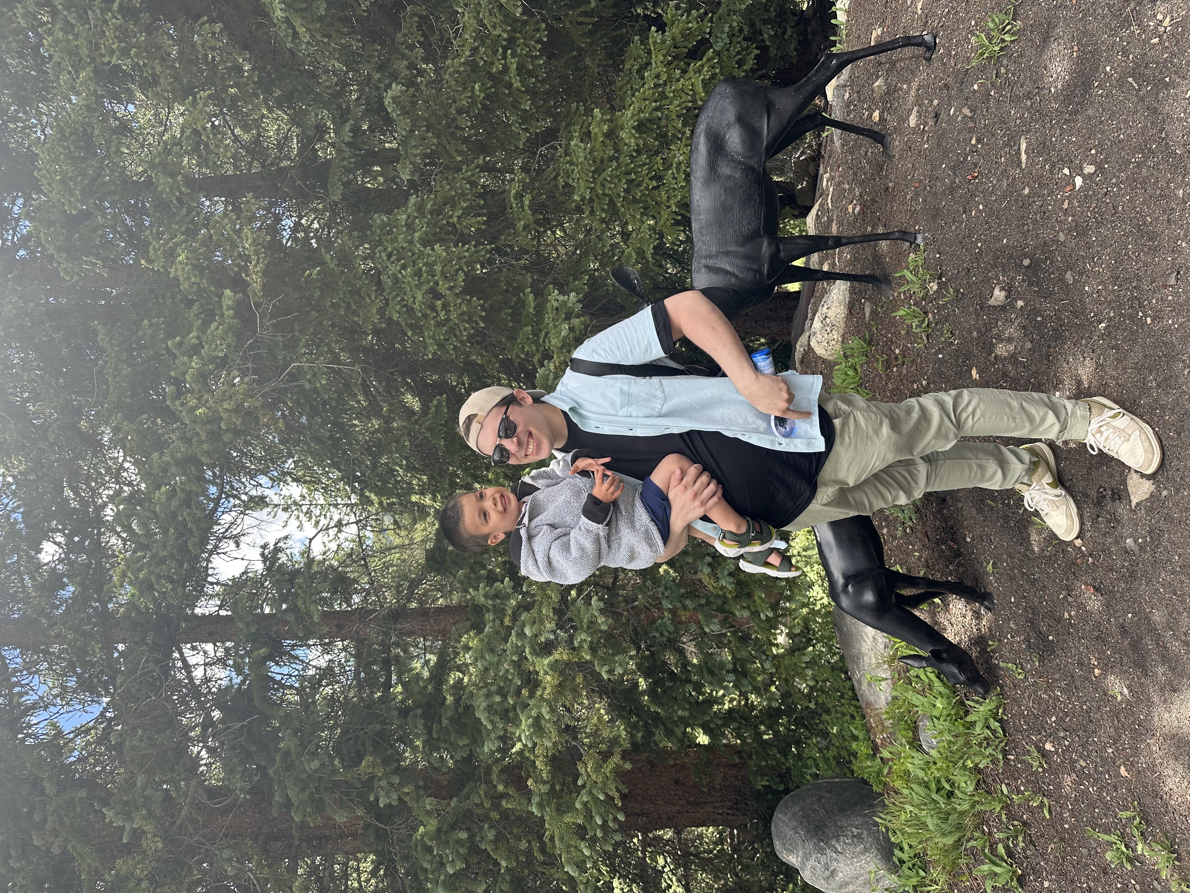 Zach and his son in the Colorado mountains